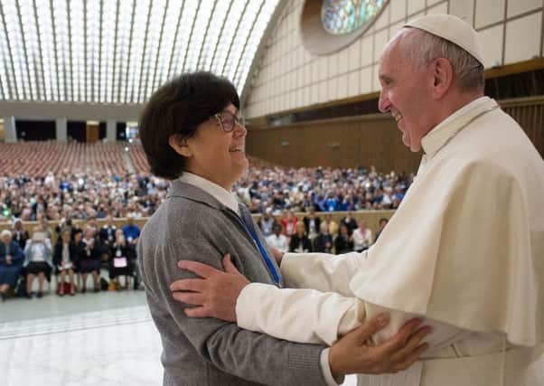 Pope Francis hugs Sister Carmen Sammut, a Missionary Sister of Our Lady of Africa. Picture: AP
