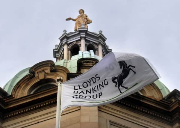 The Lloyds Banking Group flag at the former HBOS head office on the Mound in Edinburgh. Picture: Jane Barlow