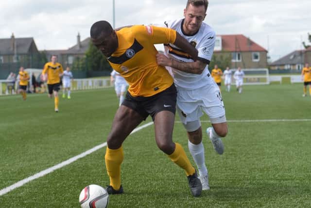 Joe Mbu, left, is availabe after having his red card rescinded. Picture: SNS.