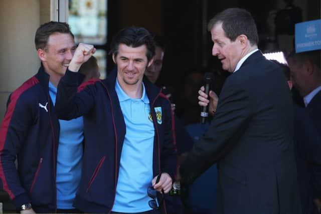 Joey Barton, centre, celebrates Burnley's Championship title win with fan Alastair Campbell. Picture: Jan Kruger/Getty Images