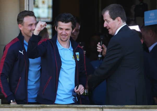 Joey Barton, centre, celebrates Burnley's Championship title win with fan Alastair Campbell.  Picture: Jan Kruger/Getty Images