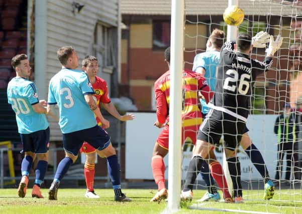 Kris Doolan (third from left) opens the scoring for Partick Thistle. Picture: Craig Williamson, SNS Group