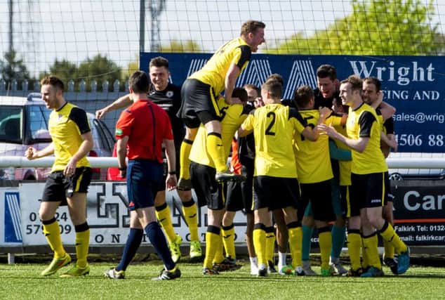 Douglas Gair (right) celebrates with his team mates after scoring to give Edinburgh City the lead. Picture: SNS