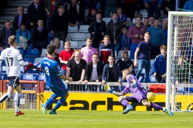 Caley Thistle's Ross Draper, centre, scores his side's third. Picture: SNS