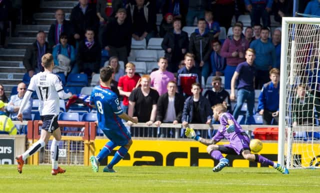 Caley Thistle's Ross Draper, centre, scores his side's third. Picture: SNS