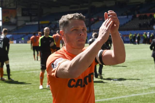 John Rankin applauds the fans after his final game for United. Picture: SNS Group