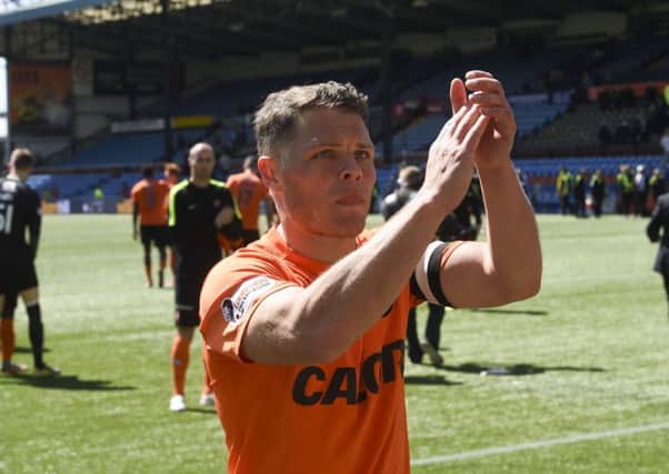 John Rankin applauds the fans after his final game for United. Picture: SNS Group