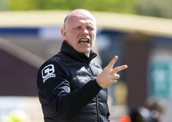 John Hughes wants to get new signings on board quickly. Picture: SNS Group