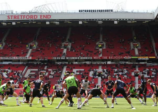 Bournemouth players warm up prior to the Barclays Premier League match between Manchester United and AFC Bournemouth at Old Trafford, which has now been abndoned. Picture: Getty Images