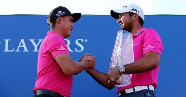 Jasin Day, right, is congratulated on his victory at TPC Sawgrass by last year's winner, Rickie Fowler. Picture: Getty Images