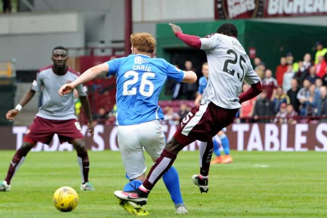 Hearts' Abiola Dauda was shown a red card for this challenge on St Johnstone's Liam Craig. Picture: SNS