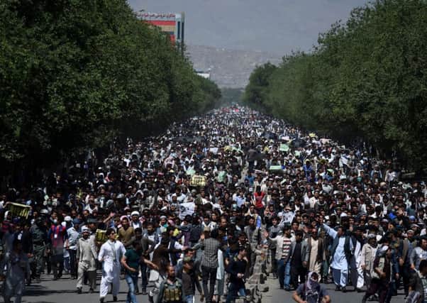 Protesters demand the power line follows its original route through Bamiyan province, in the central highlands, where most of the countrys Hazaras live. Picture: AFP/Getty Images