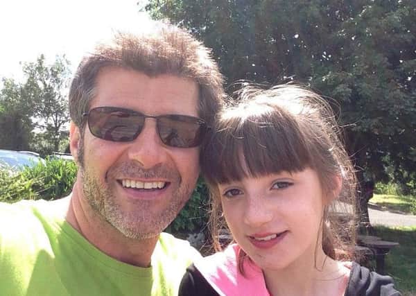 Dave Clements and his daughter Lily. Picture: Contributed