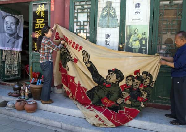 A banner from 1969 depicting former Chinese leader Mao Zedong. Picture: AP