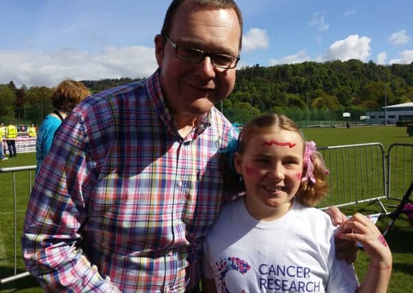 Nine-year-old Lucy Robertson with dad Gordon, launching first Race for Life 2016