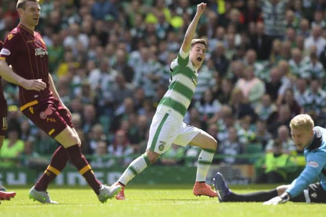 Celtic youngster Jack Aitchison celebrates scoring his sides seventh goal in their final Premiership game of the season against Motherwell on Sunday. Picture: SNS