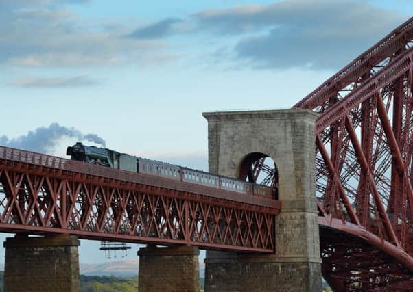 The Flying Scotsman crosses the Forth Bridge on Sunday on its return to Scotland after 16 years. Picture:: Getty Images