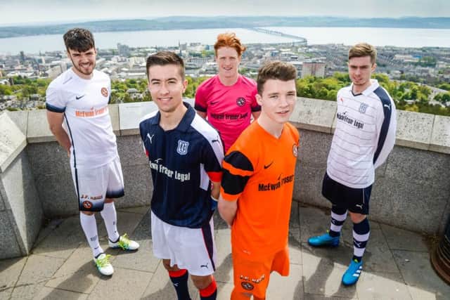 Dundee and Dundee United launch their new joint sponsorship deal with McEwan Fraser Legal at Dundee Law. From left: Scott Fraser, Cammy Kerr, Simon Murray, Ali Coote, Craig Wighton. Picture: Nick Ponty