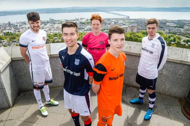 Dundee and Dundee United launch their new joint sponsorship deal with McEwan Fraser Legal at Dundee Law. From left: Scott Fraser, Cammy Kerr, Simon Murray, Ali Coote, Craig Wighton. Picture: Nick Ponty