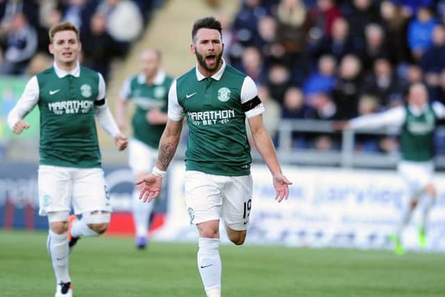 Keatings celebrates after giving Hibs the lead against Falkirk. Picture: Michael Gillen