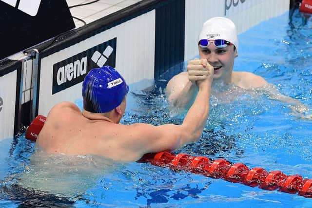 Adam Peaty, left, and Ross Murdoch congratulate one another after the 100m breaststroke final at the London Aquatic Centre. Picture: Leon Neal/AFP/Getty
