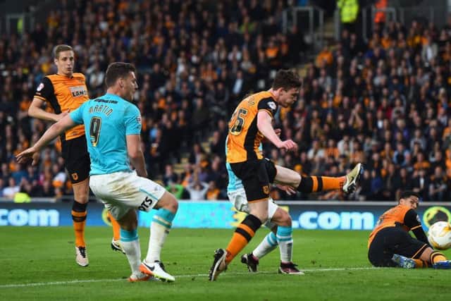 Hull defender Andy Robertson scores an own goal during the Championship play-off semi-final second leg match against Derby. Picture: Laurence Griffiths/Getty Images