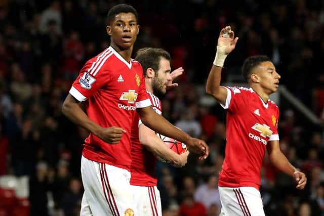 Manchester United's Marcus Rashford celebrates scoring his side's second goal against Bournemouth. Picture: Martin Rickett/PA Wire
