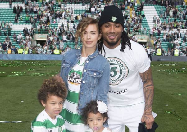 Colin Kazim-Richards celebrates Celtic's title success with his family but the striker 'brings nothing to the party' says Charlie Nicholas. Picture: Danny Lawson/PA Wire.