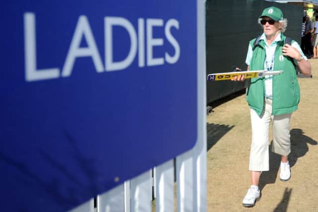 A female spectator at Muirfield during the course's hosting of the 142nd Open Championship in July 2013. Picture: Jane Barlow