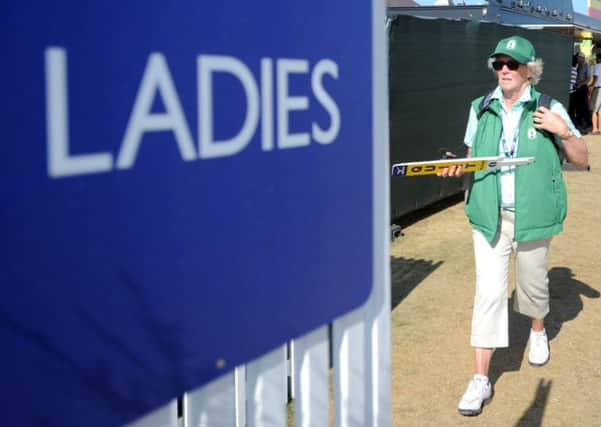 A female spectator at Muirfield during the course's hosting of the 142nd Open Championship in July 2013. Picture: Jane Barlow