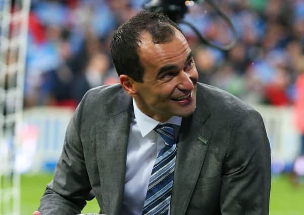 Manager Roberto Martinez  celebrates Wigan's victory over Manchester City in the 2013 FA Cup final at Wembley. Picture:  Alex Livesey/Getty Images