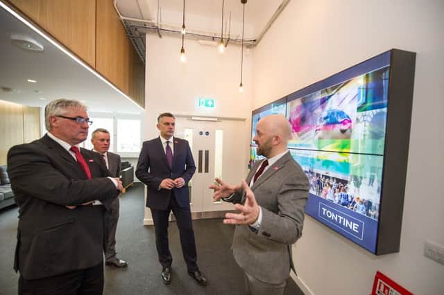 Councillor Frank McAveety, Leader of Glasgow City Council, and Councillor Mark Macmillan, Leader of Renfrewshire Council, open The Tontine. Picture: TSPL/ John Devlin