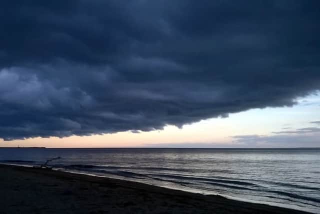 Storm clouds gather over Monifieth Beach. Picture: Contributed/ Jim Ferrier