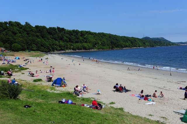 Sun seekers enjoy the fine weather at Aberdour Silver Sands.  Picture: JP/ Ian Rutherford