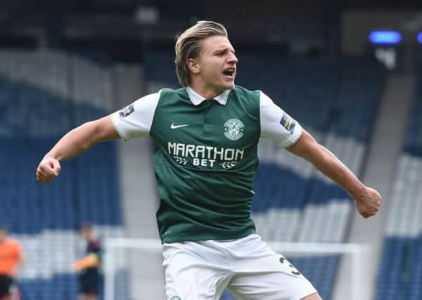Hibernian's Jason Cummings celebrates after netting the winning penalty in the sem-final against Dundee United. Picture: Craig Williamson/SNS