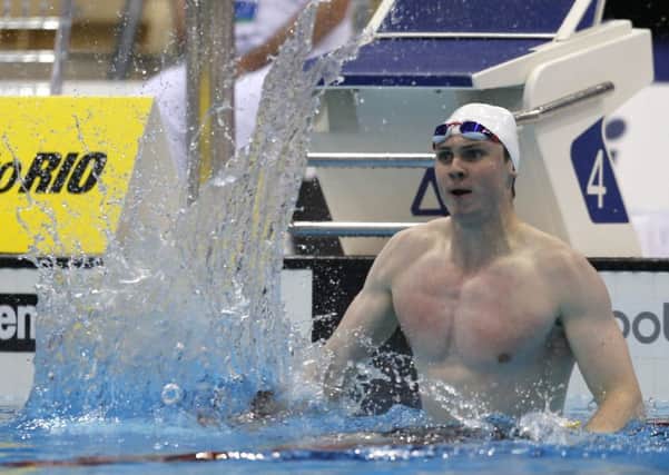 Stirling's Ross MurdochÂ splashes the water in celebration after winning the gold medal in the men's 200m breaststroke final at the European Swimming Championships. Picture: Frank Augstein/AP