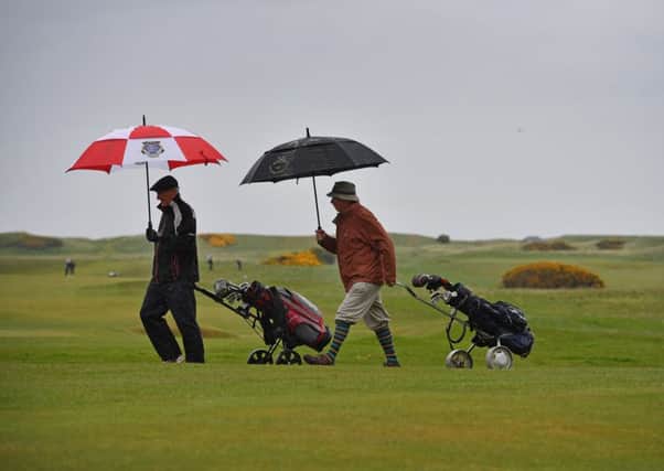 Men play golf at Muirfield Golf Club where they rejected the decision on women as members. Picture: Getty