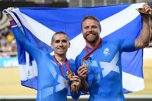 Scotland's Neil Fachie (left) and pilot Craig MacClean win gold in the Men's Para-Sport Sprint B Tandem final. The Commonwealth Games provided a huge boost to tourism in Scotland. Picture: Jane Barlow.