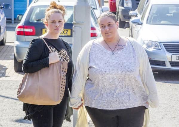 Rachael Fee, or Trelfa, left, and her partner Nyomi Fee outside the High Court in Livingston. Picture: PA