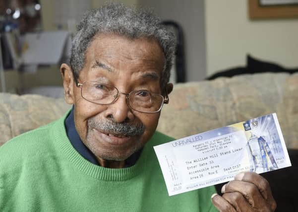 106-year-old Hibs fan Sam Martinez with his Cup final ticket. Picture: Greg Macvean