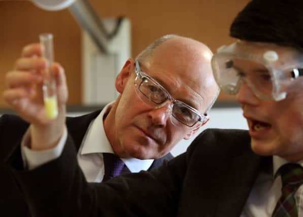 Deputy First Minister and new Education Secretary John Swinney visits Forrester High School. Picture: PA