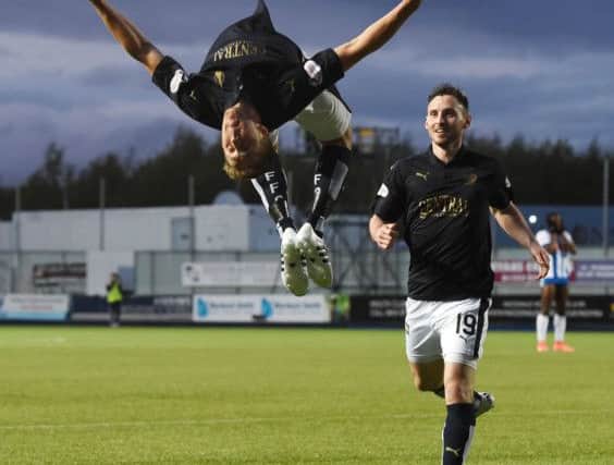 Falkirk's Will Vaulks celebrates as he gives his side the advantage in the first leg
