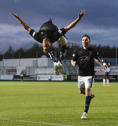 Falkirk's Will Vaulks celebrates as he gives his side the advantage in the first leg