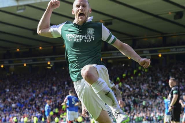 Hibs captian David Gray celebrates scoring the winning goal and ending his side's 144 year Cup drought. Picture: SNS/Alan Harvey