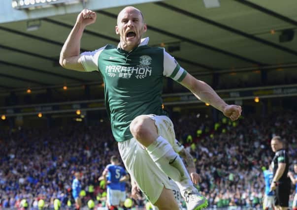 Hibs captian David Gray celebrates scoring the winning goal and ending his side's 144 year Cup drought. Picture: SNS/Alan Harvey