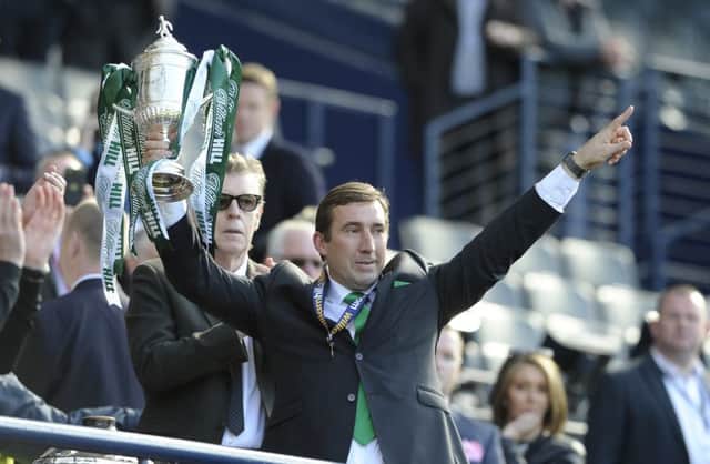 Alan Stubbs lifts the Scottish Cup. His winners medal will be auctioned for charity. Picture: Neil Hanna