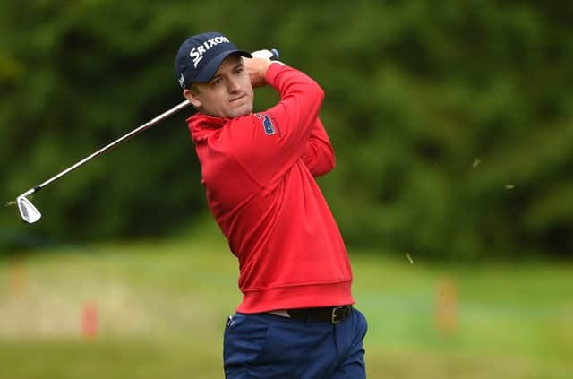 Russell Knox hits his second shot on the 17th hole at the Irish Open. Picture: Ross Kinnaird/Getty Images