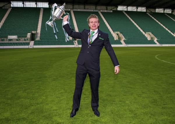 Jason Cummings celebrates with the Scottish Cup at Easter Road. Picture: SNS Group