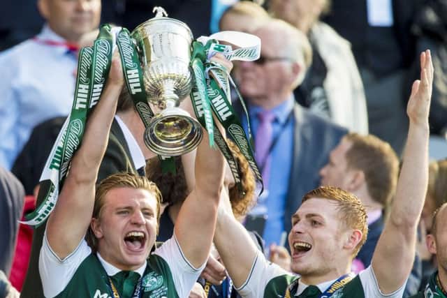 Cummings and Fraser Fyvie celebrate winning the Scottish Cup. Picture: SNS Group