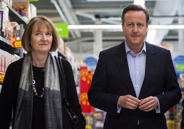 Prime Minister David Cameron and former deputy Labour leader Harriet Harman  visit an Asda branch in London for the Remain campaign. Picture: Jack Taylor/PA Wire